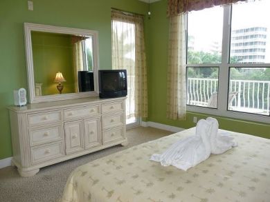 Bedroom with TV and Balcony
